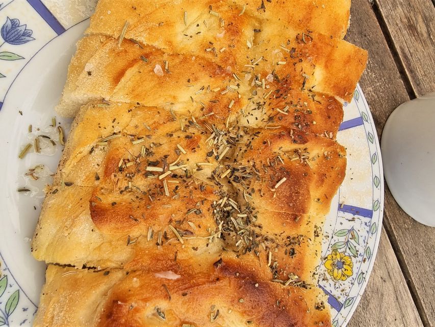 Ajaccio: Local Food Tour with Tastings - Sheep and goat cheeses in a small shop