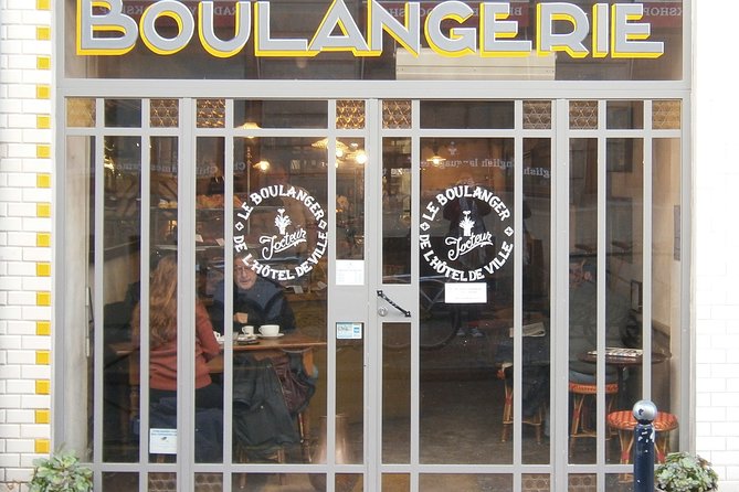 Bordeaux Historic and Gourmet Food Walking Tour - Chocolate adds a look behind the shop counter