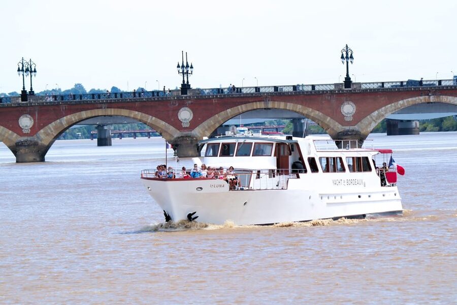 Bordeaux: River Garonne Cruise with Glass of Wine and Canelé - Wine, a canelé, and the open bar
