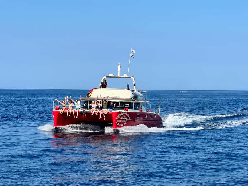 Catamaran cruise to the Lavezzi Islands - Passing Cavallo Island
