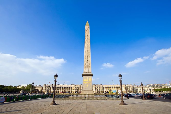 Eiffel Tower Summit Option with Seine River Cruise and City Tour - Place de la Concorde to Montmartre from a bus seat