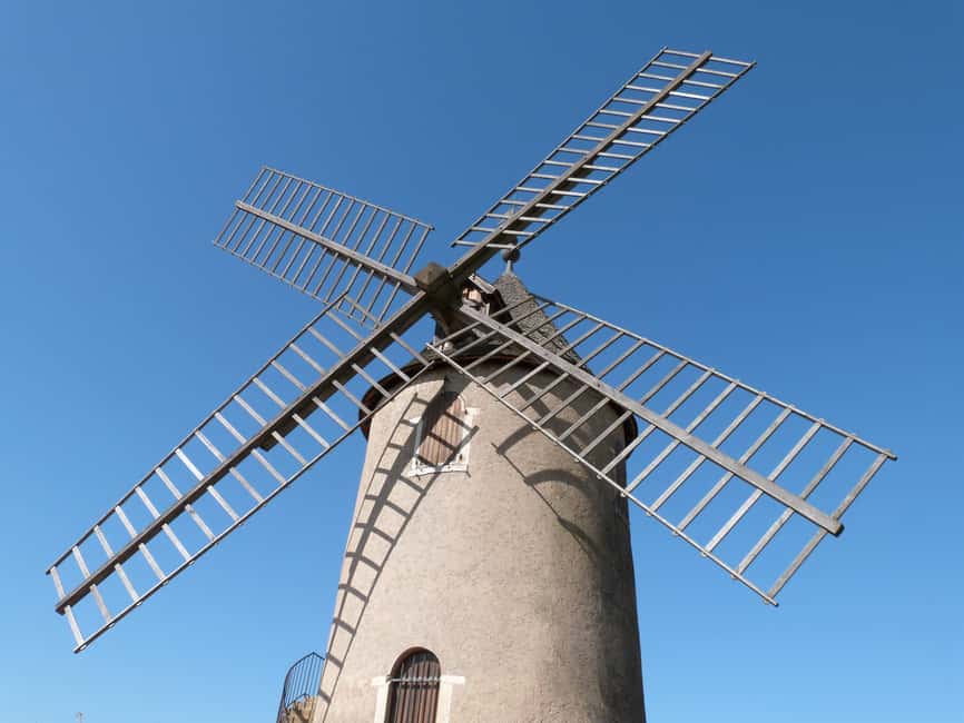 From Lyon: Beaujolais Wine Route Half-Day Tour - Meeting in Bellecour and riding into wine country