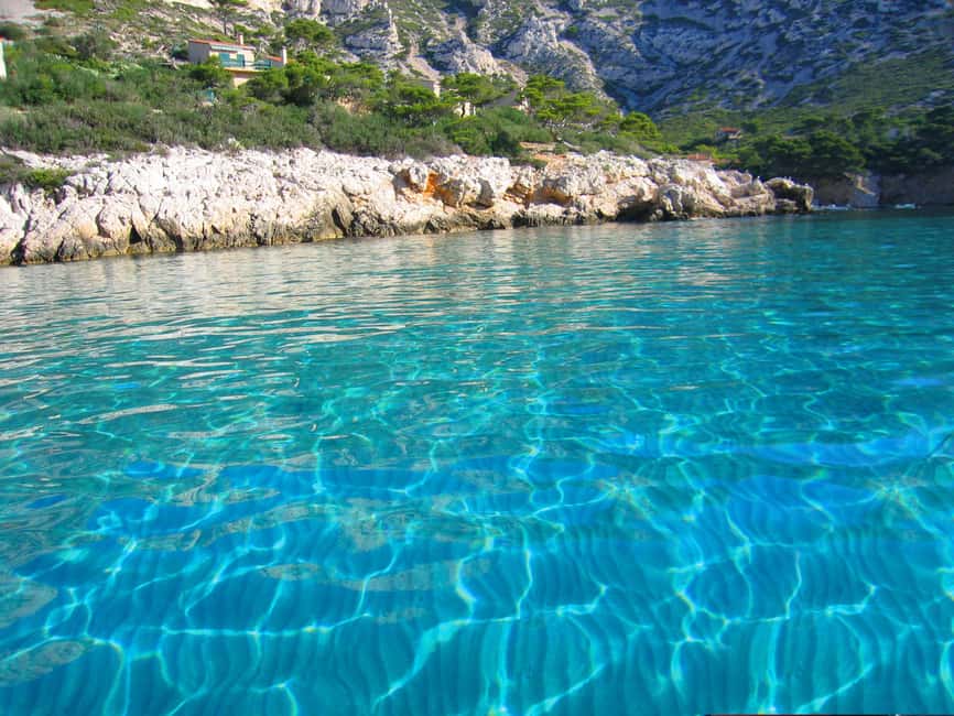 From Marseille: Iconic Calanques Boat Tour with Swimming - Swimming and snorkeling in the park
