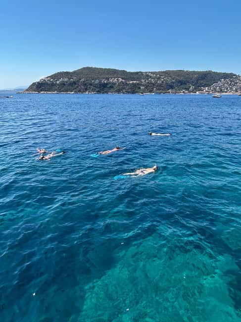 From Nice: Villefranche Bay Swimming & Snorkeling Boat Tour - Villefranche Bay gives you calm water and coastal scenery