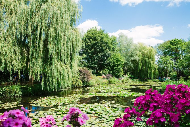 From Paris: Monet Gardens & Giverny Bike Tour with Picnic Stop - A picnic beside the Seine and the old mill