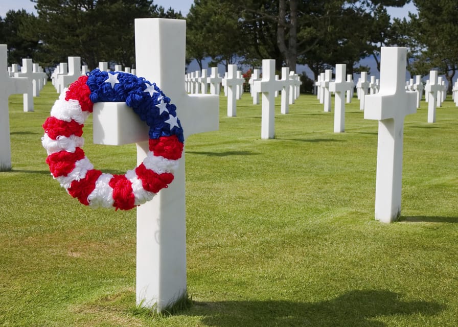 From Paris: Normandy D-Day Beaches Day Trip with Lunch - Pointe du Hoc and the cliffs above the sea