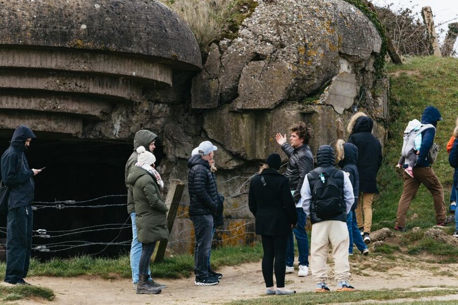 From Paris: Normandy D-Day Landing Beaches Full-Day Tour - The Overlord Museum adds machines and human detail