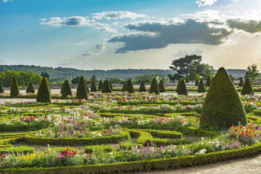 From Paris: Versailles Palace and Gardens Guided Experience - Starting at Invalides and taking the train to Versailles