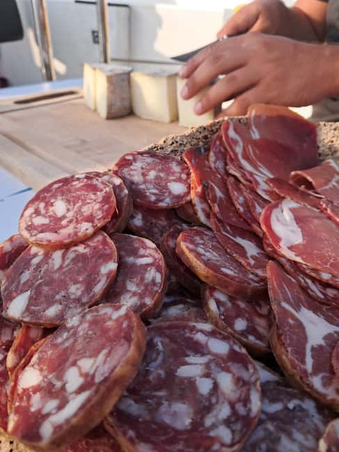 From Santa Giulia SUNSET Cruise & Apéritif - Corsican wine and charcuterie at golden hour