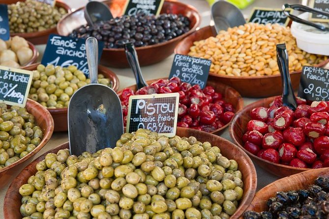 Luberon Market & Villages Day Trip from Aix-en-Provence - Roussillon brings ochre color to the route