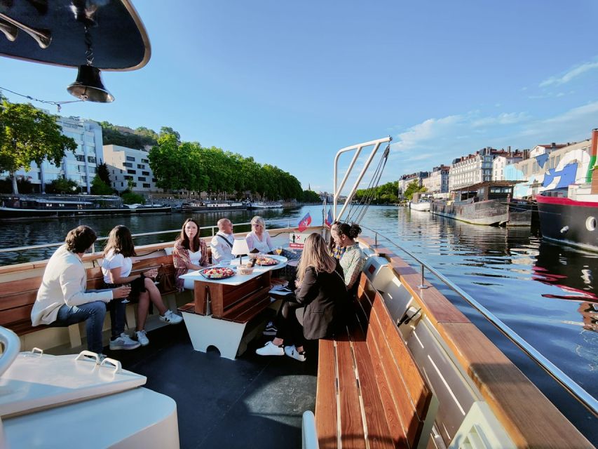 Lyon: City Cruise with Charcuterie, Cheese, and Wine - Boarding at Confluence requires attention