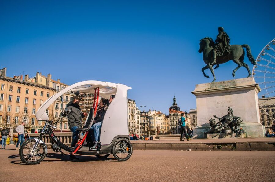 Lyon: Private Pedicab Tour of Top Landmarks & Hidden Gems - Riding uphill toward Croix-Rousse