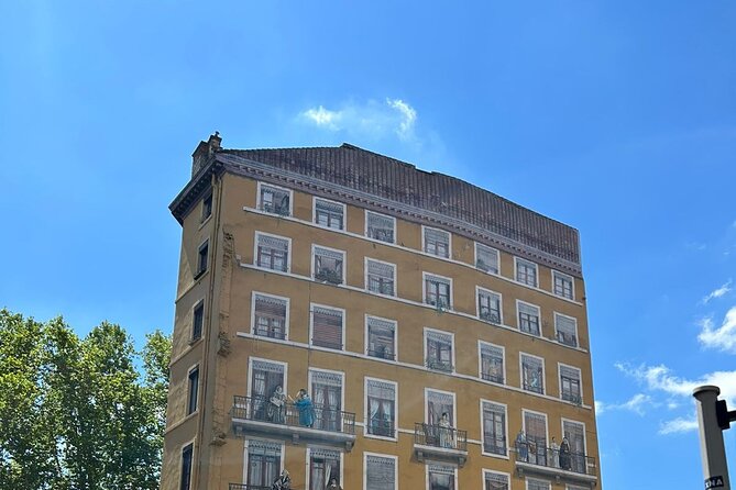 Lyon Walking Tour: Explore Top Sights & Hidden Gems - Entering Vieux Lyon through traboules and courtyards