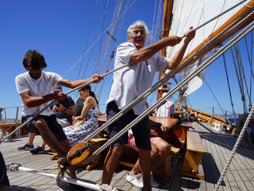 Marseille: Calanques Sailing Day Trip with Lunch and Wine - Swimming and snorkeling from the yacht