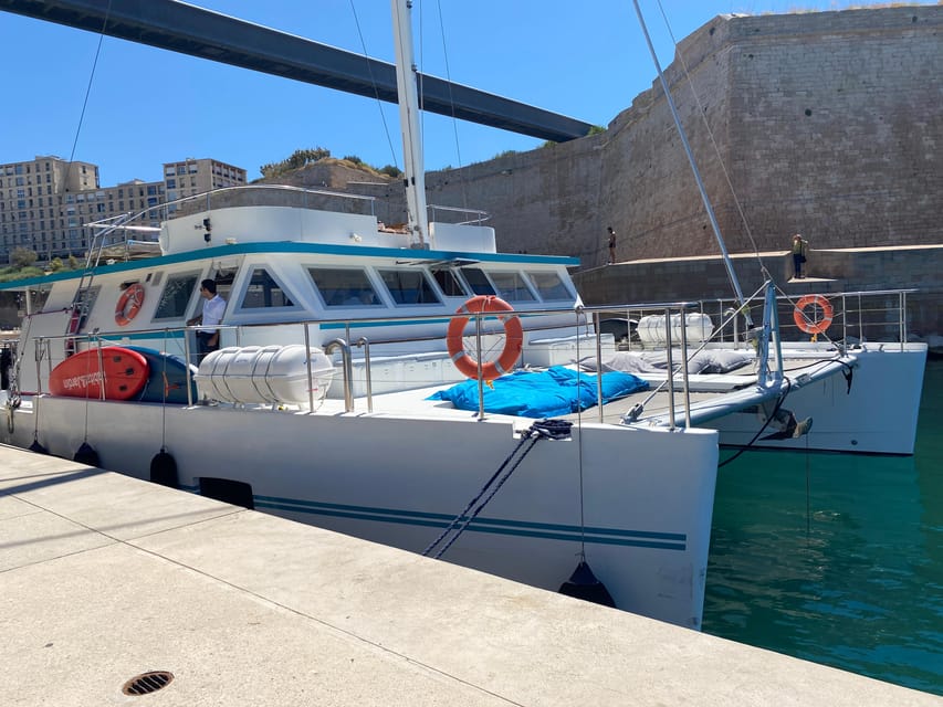 Marseille: Frioul Archipelago Catamaran Cruise with Lunch - Swimming in clear Mediterranean water