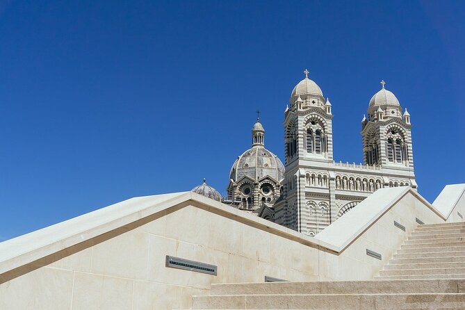 Marseille Walking Tour: Explore Top Sights & Hidden Gems - Hôtel Dieu, from hospital to luxury hotel