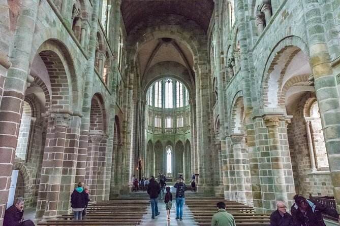 Mont Saint Michel Day Trip from Paris with English Speaking Guide - Arriving at the Abbey-Crowned Island