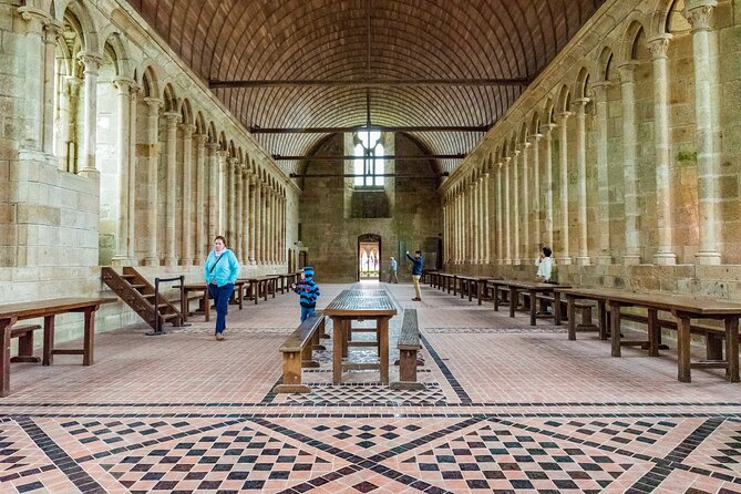Mont Saint Michel Day Trip from Paris with English Speaking Guide - Climbing Through the Medieval Village