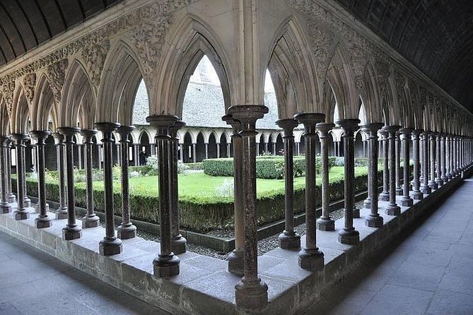 Mont St Michel Full Day Tour with a National Guide from Bayeux - Entering the Abbey above the bay