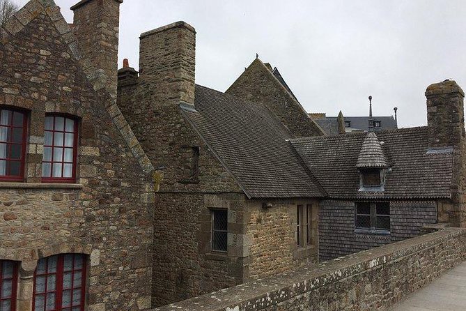 Mont St Michel Full Day Tour with a National Guide from Bayeux - Crowds, comfort, and driving concerns