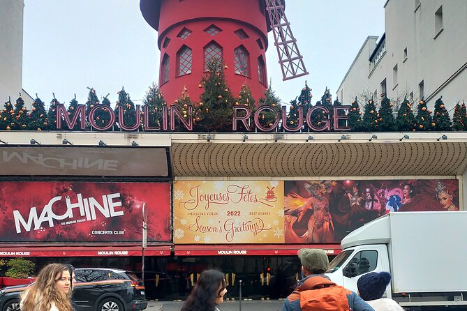 Montmartre Hidden Gems and Scenic Highlights Walking Tour - Moulin de la Galette and the Man Who Walked Through the Wall