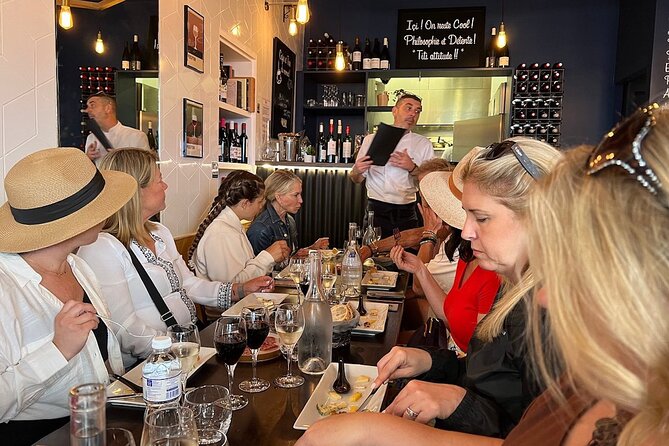 Montmartre Hill French Gourmet Food and Wine Tasting Walking Tour - Place du Tertre and the Artists’ Quarter