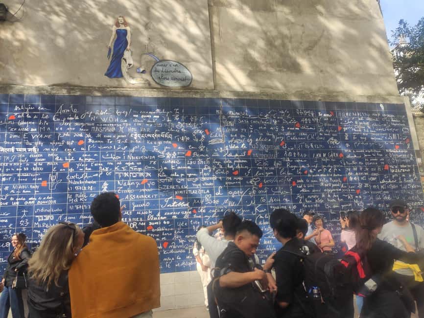 Montmartre Walking Tour with a Local Guide - Place du Tertre, where art becomes a public show
