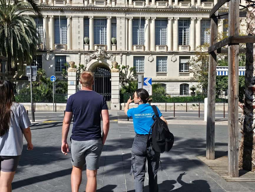 Nice: Old City Highlights Walking Tour with a local guide - Reading the Bay of Angels and the Centenary Monument