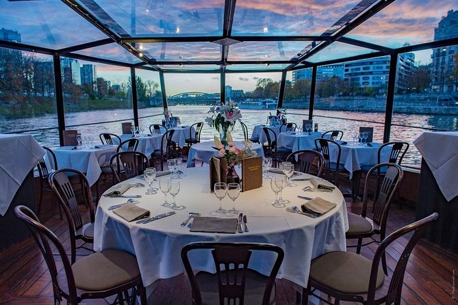 Paris 3-Course Gourmet Dinner and Sightseeing Seine River Cruise - The glass-enclosed boat and the view