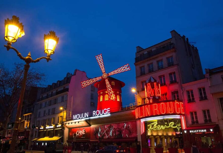 Paris: Champagne at the Moulin Rouge & Seine River Cruise - Inside the Moulin Rouge Féerie revue