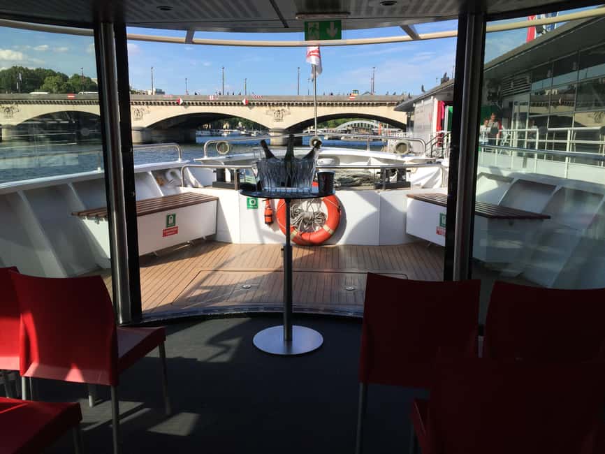 Paris: Champagne Tasting Cruise Departure from Eiffel Tower - Boarding the Private Bow Salon