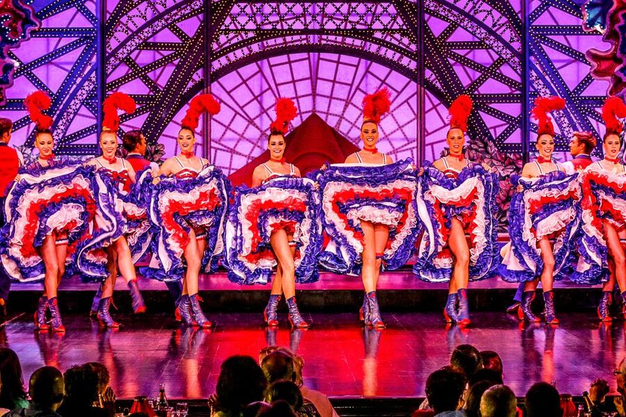 Paris: Dinner Show at the Moulin Rouge - Féerie: feathers, music, and high-speed spectacle