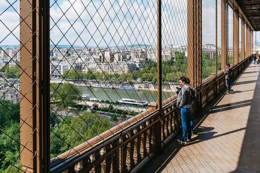 Paris: Eiffel Tower Fully Guided Tour with Summit Option - Riding up to the Eiffel Tower’s second floor