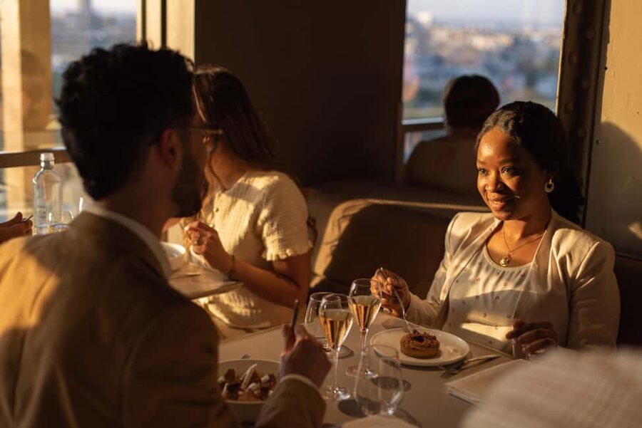 Paris: Elegant Dinner with Drinks in the Eiffel Tower - Reaching Madame Brasserie at the South entrance