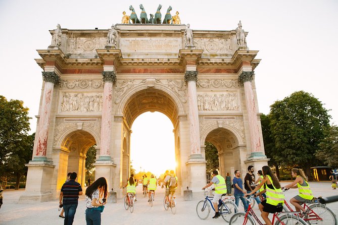Paris Evening Snapshot Bike Tour - Riding past the Louvre and Academie Française