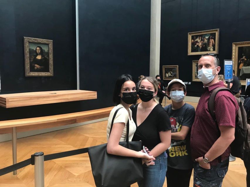Paris: Guided Louvre Museum Tour with Optional Entry Ticket - Greek sculpture on the grand staircase