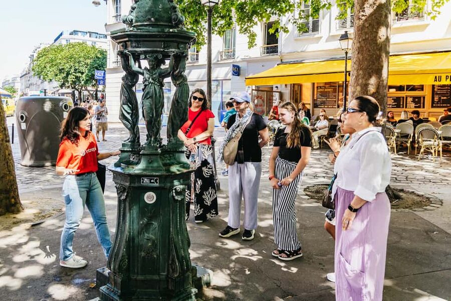 Paris: Hidden Gems of Montmartre with Local Guide - Moulin de la Galette and the village atmosphere