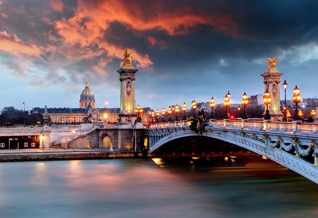 Paris Illuminations Tour with Moulin Rouge Show and Cruise Option - Champagne, shared tables, and cabaret etiquette