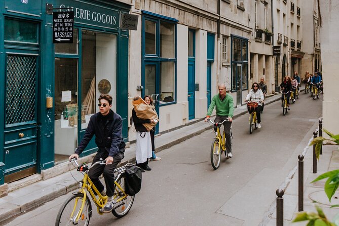 Paris Local Districts and Stories Off the Beaten Track Guided Bike Tour - Starting at Le Peloton Café near the Seine