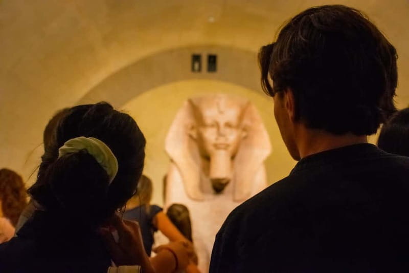 Paris: Louvre Museum Highlights Small-Group Guided Tour - The opening sculpture and the start of the story