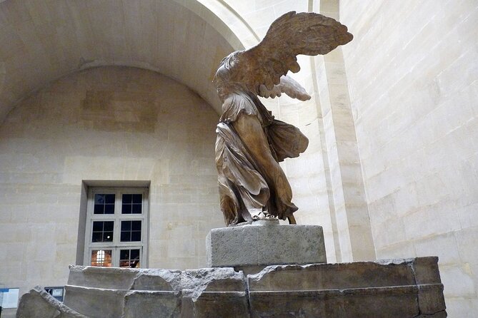 Paris: Louvre Museum Tour Mona Lisa & Iconic Masterpieces - Entering through the pyramid with a reserved ticket