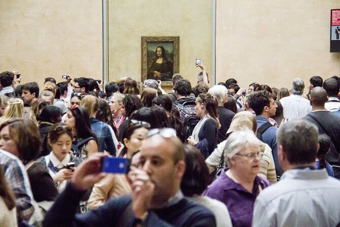 Paris: Louvre Museum Tour Mona Lisa & Iconic Masterpieces - Winged Victory and the dramatic staircase
