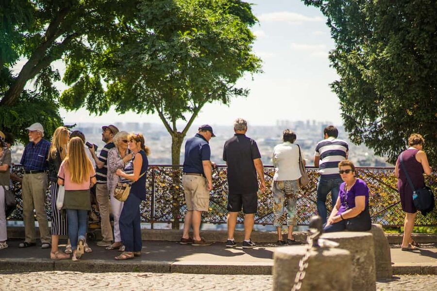 Paris Montmartre: 2-Hour City Tour in German - Lapin Agile, Clos Montmartre, and quieter stories