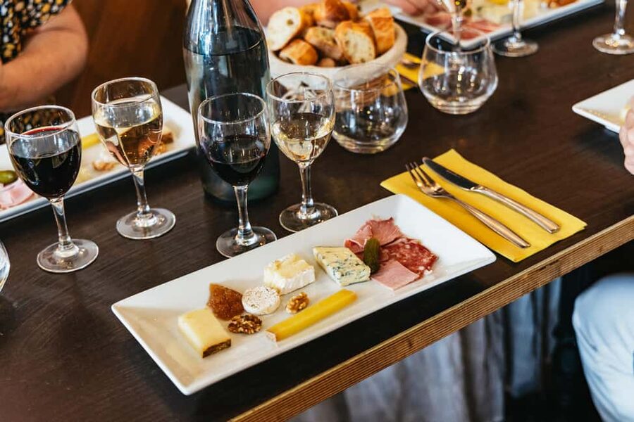 Paris: Montmartre Cheese, Wine & Pastry Guided Walking Tour - Starting at Blanche, where food and nightlife meet