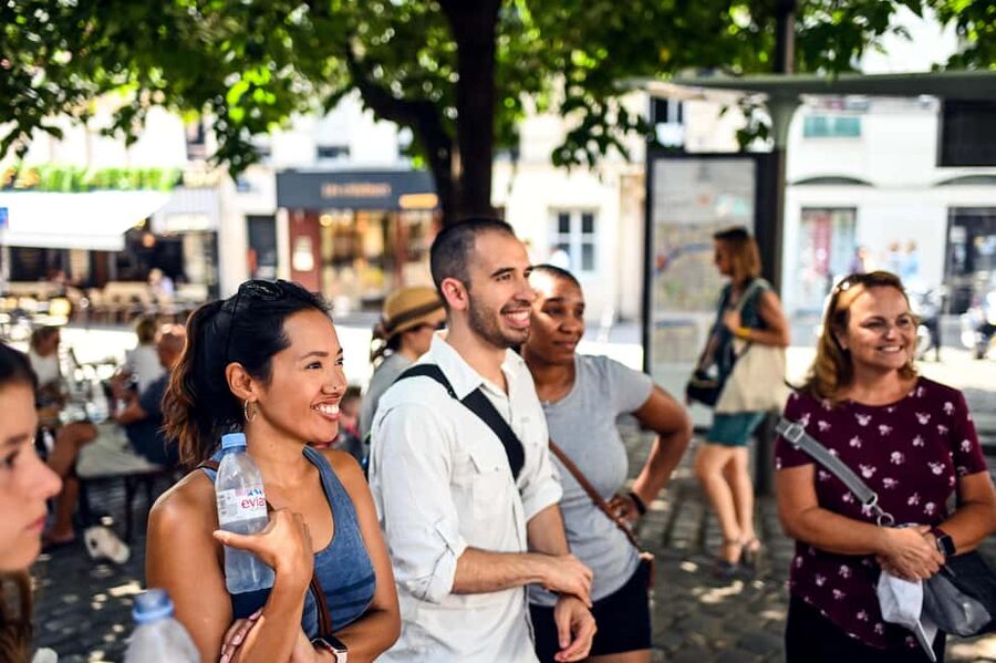 Paris: Montmartre Food Tasting Walking Tour with Secret Dish - Cured Meats at the Butcher