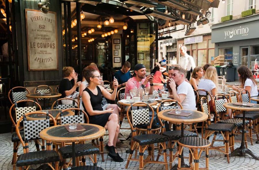 Paris: Montmartre Food Tour with Full Meal - Place des Abbesses and the neighborhood’s softer side