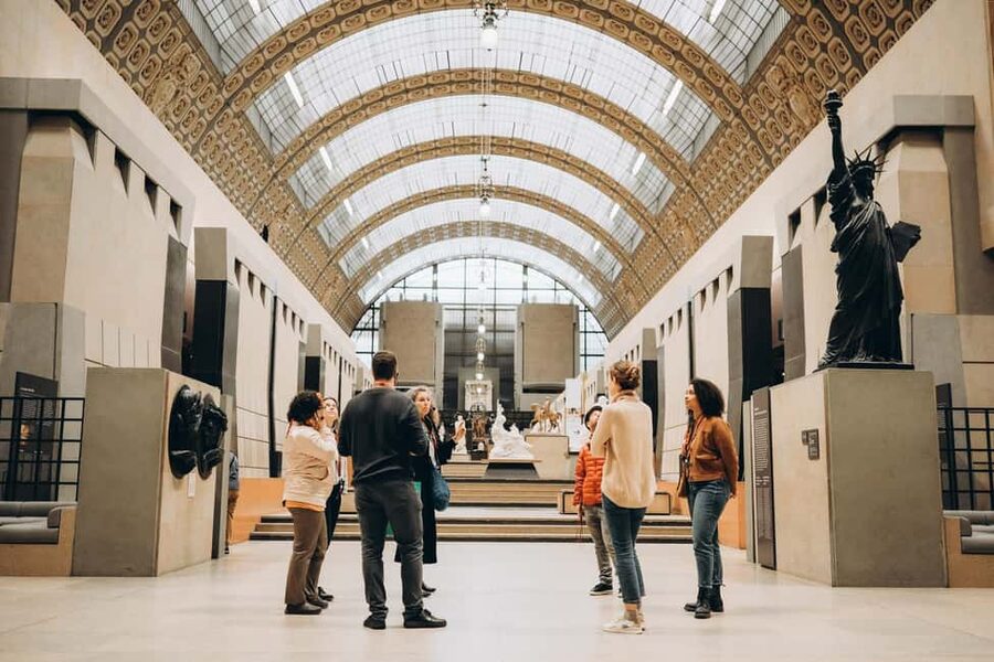 Paris: Musée d’Orsay Ticket and Guided Tour - Meeting the guide beside the rhinoceros
