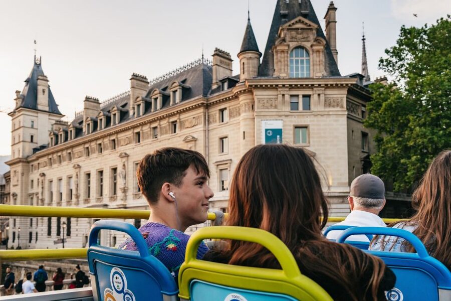 Paris: Night Bus Tour with Audioguide - Notre Dame and Place de la Concorde after dark