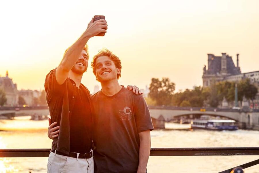 Paris: Night Small-Group Bike Tour and Boat Cruise - Invalides and the Champs-Élysées after dark