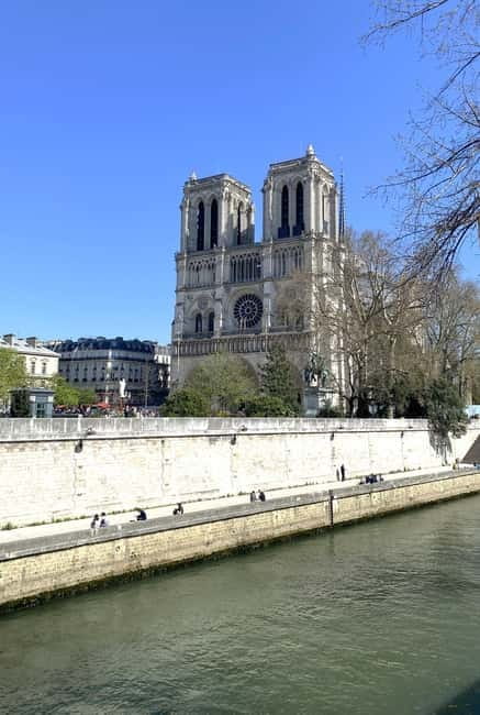 Paris: Notre-Dame Cathedral Exterior Guided Tour - Seeing gargoyles, rosettes, rooflines, and the rear views